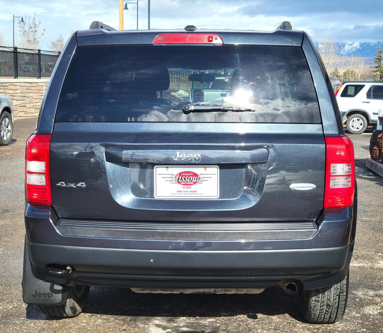 2014 Blue /Black Jeep Patriot Latittude (1C4NJRFB7ED) with an 2.4L I4 engine, 6 Speed Automatic transmission, located at 450 N Russell, Missoula, MT, 59801, (406) 543-6600, 46.874496, -114.017433 - Photo#5